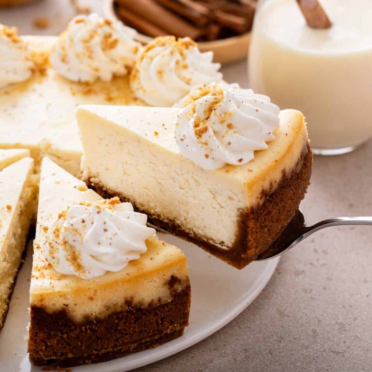 Decadent Eggnog Cheesecake Topped with Eggnog Whipped Cream